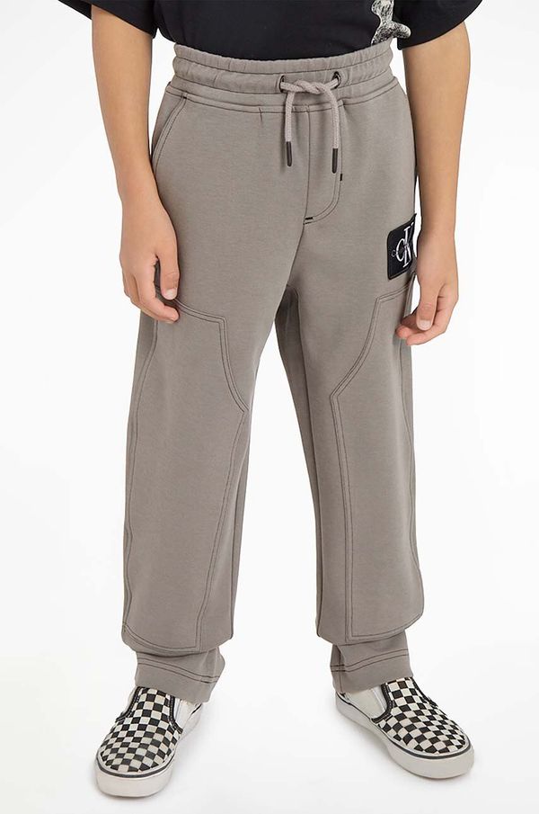 Calvin Klein Jeans Dječji donji dio trenirke Calvin Klein Jeans boja: siva, glatki materijal