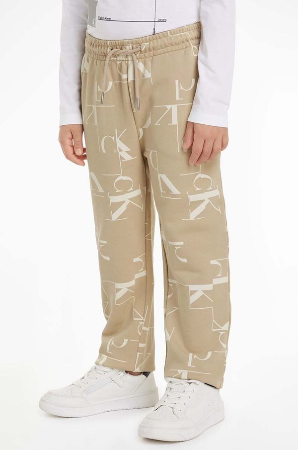 Calvin Klein Jeans Dječji pamučni donji dio trenirke Calvin Klein Jeans TERRY JOGGER boja: bež, s uzorkom, IB0IB02124