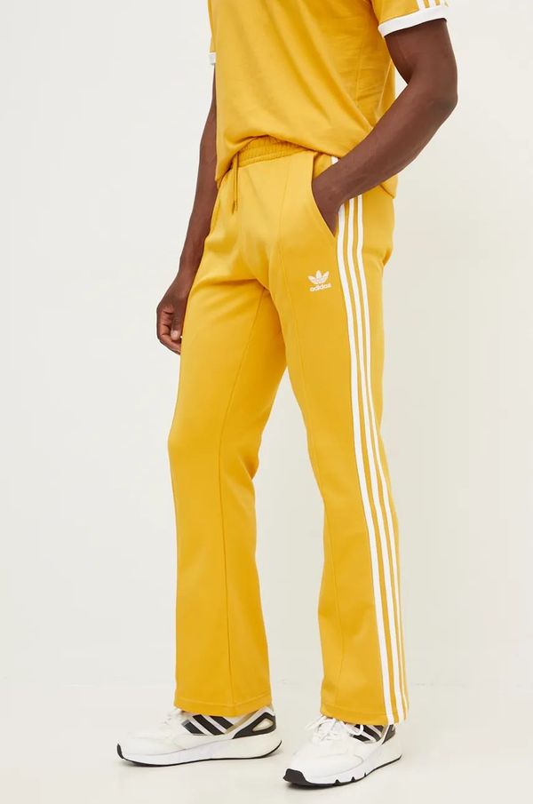 adidas Originals Donji dio trenirke adidas Originals 70S Track Pant boja: žuta, s aplikacijom, IX5223