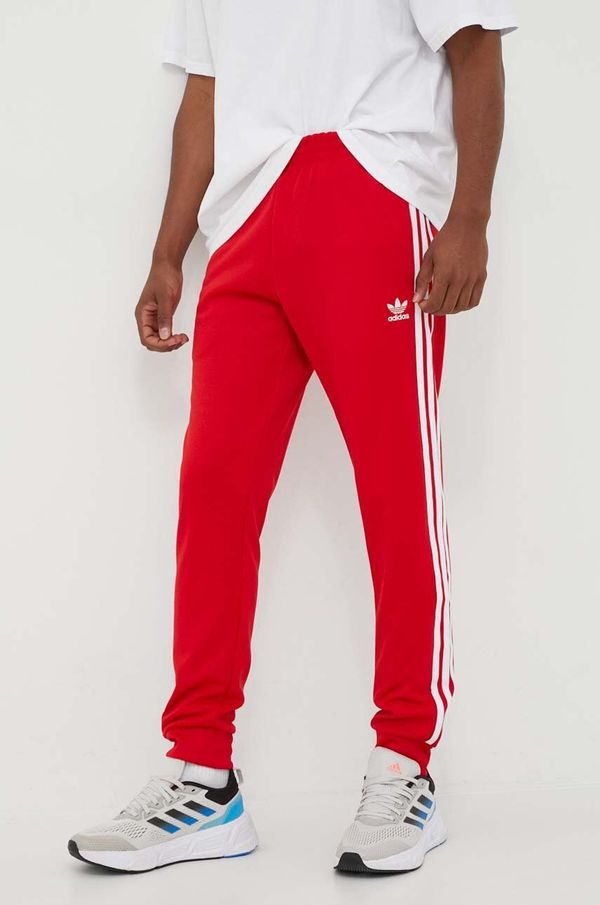 adidas Originals Donji dio trenirke adidas Originals boja: crvena, s aplikacijom
