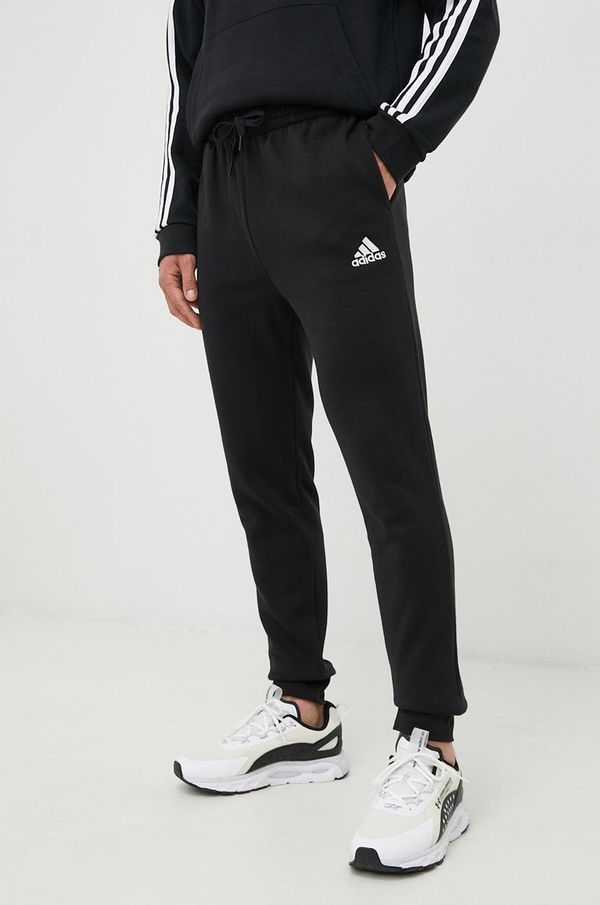 adidas Donji dio trenirke adidas za muškarce, boja: crna, glatki materijal HL2236