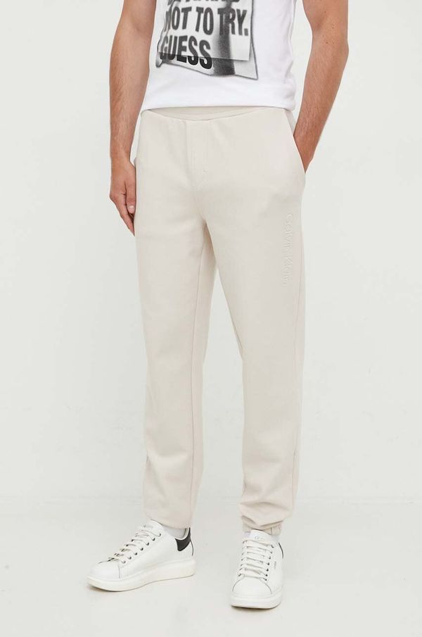 Calvin Klein Donji dio trenirke Calvin Klein boja: bež, glatki materijal