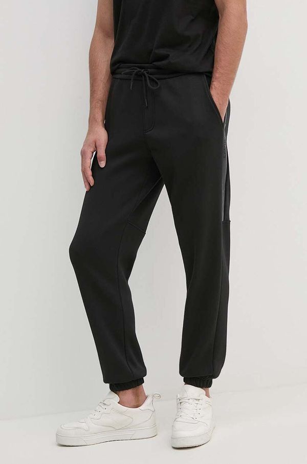 Calvin Klein Jeans Donji dio trenirke Calvin Klein Jeans boja: crna, s aplikacijom, J30J325659