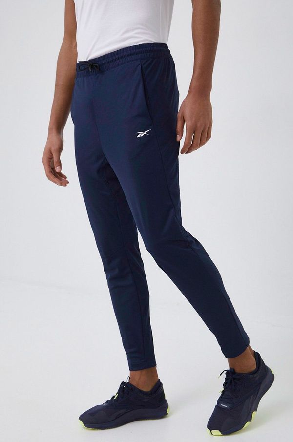 Reebok Donji dio trenirke Reebok za muškarce, boja: tamno plava, glatki materijal