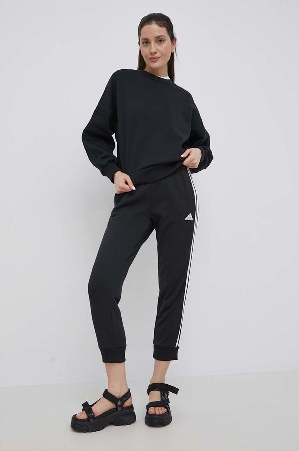 adidas Hlače adidas za žene, boja: crna, s aplikacijom