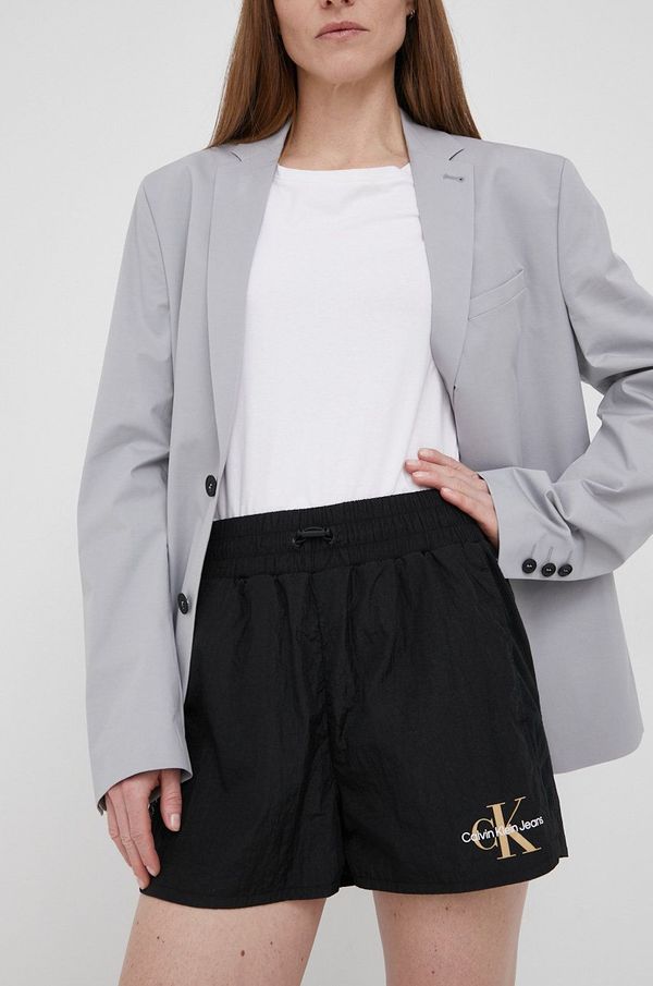 Calvin Klein Jeans Kratke hlače Calvin Klein Jeans za žene, boja: crna, s tiskom, srednje visoki struk