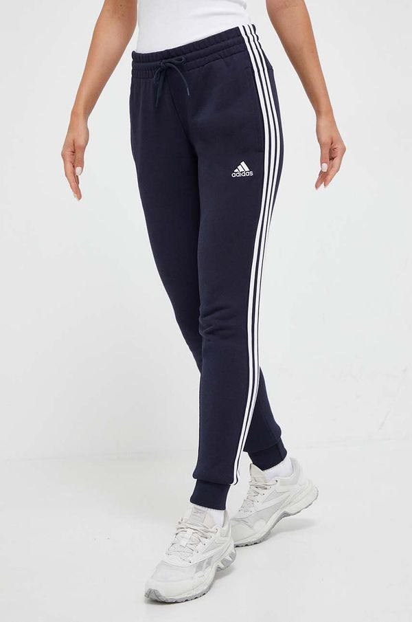 adidas Pamučni donji dio trenirke adidas boja: tamno plava, s aplikacijom
