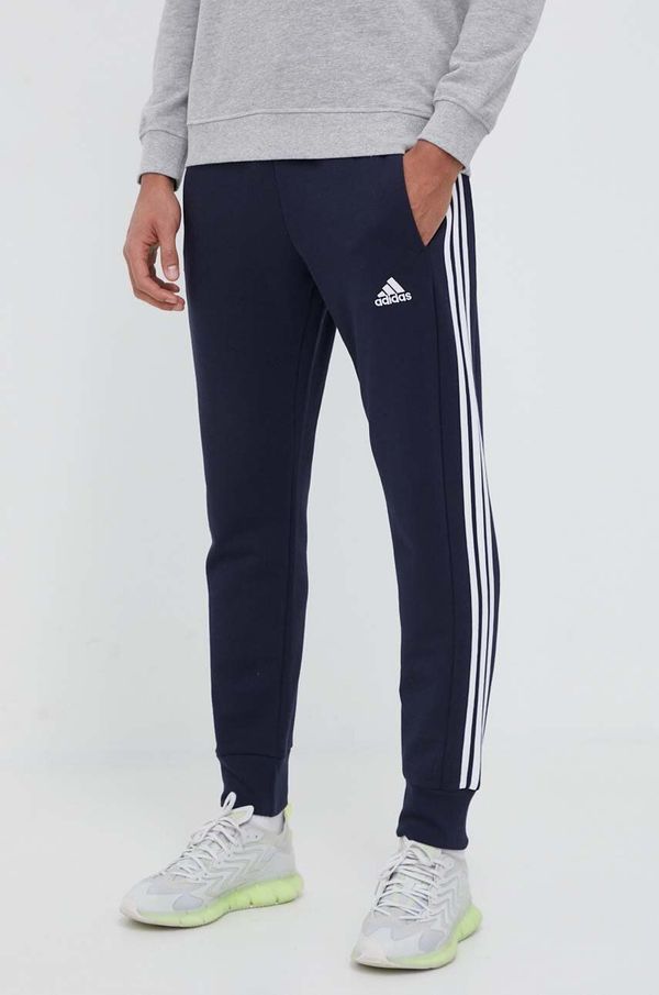 adidas Pamučni donji dio trenirke adidas boja: tamno plava, s aplikacijom