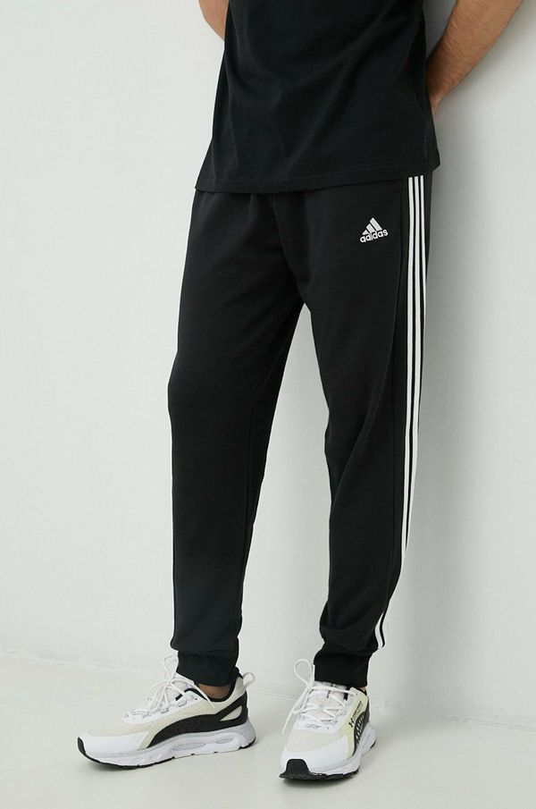 adidas Pamučni donji dio trenirke adidas Za muškarce, boja: crna, s aplikacijom