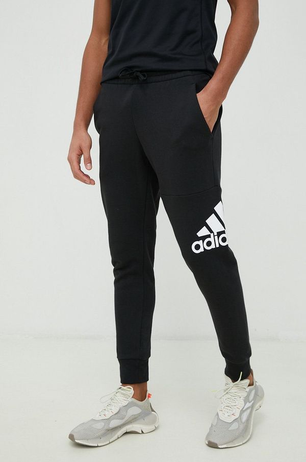 adidas Pamučni donji dio trenirke adidas za muškarce, boja: crna, s tiskom