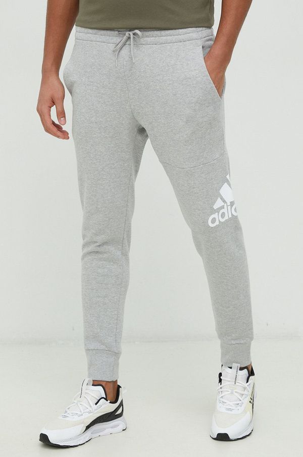 adidas Pamučni donji dio trenirke adidas za muškarce, boja: siva, s tiskom