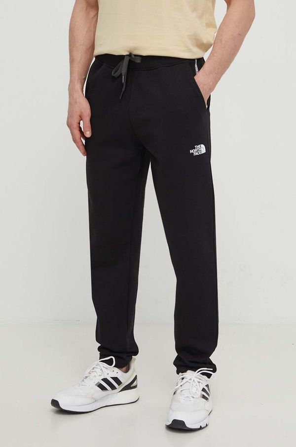 The North Face Pamučni donji dio trenirke The North Face boja: crna, s tiskom, NF0A87DEJK31