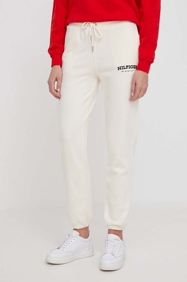 Tommy Hilfiger Pamučni donji dio trenirke Tommy Hilfiger boja: bež, s tiskom, WW0WW41572