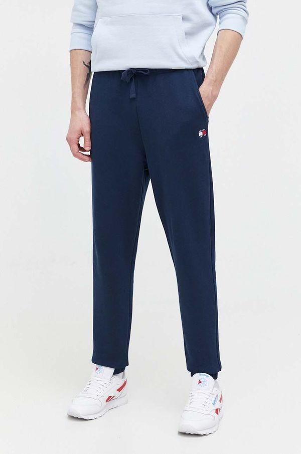 Tommy Jeans Pamučni donji dio trenirke Tommy Jeans boja: tamno plava, bez uzorka, DM0DM18355