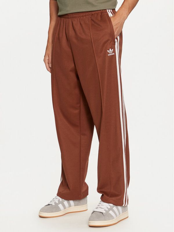 adidas adidas Donji dio trenerke adicolor Firebird IZ2476 Smeđa Baggy Fit