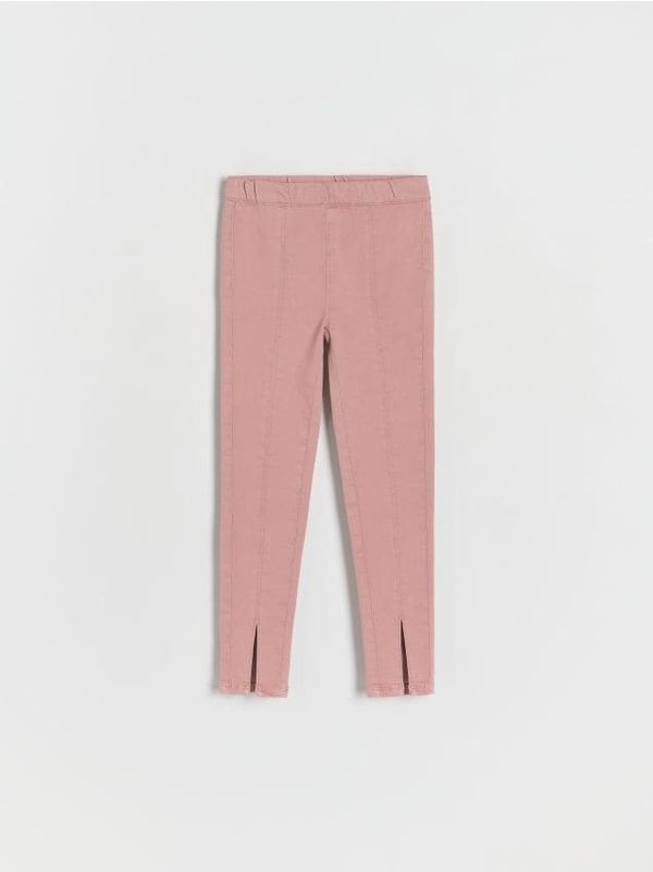Reserved Reserved - Jegging hlače s izrezom na porubu - pastelnoružičasto