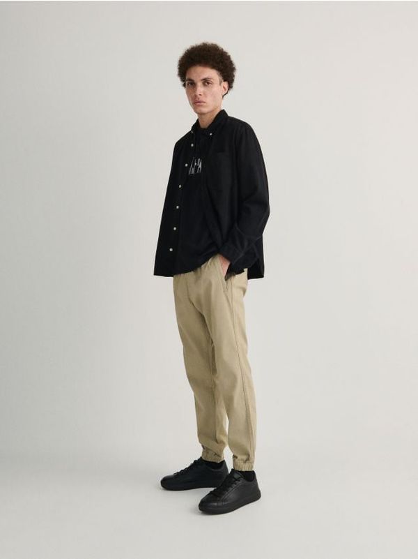 Reserved Reserved - Slim fit jogger hlače - bež