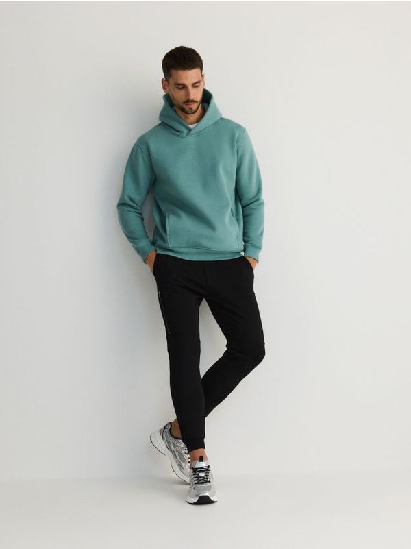 Reserved Reserved - Slim jogger hlače - crno