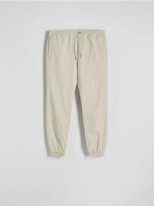 Reserved Reserved - Slim jogger hlače - krem