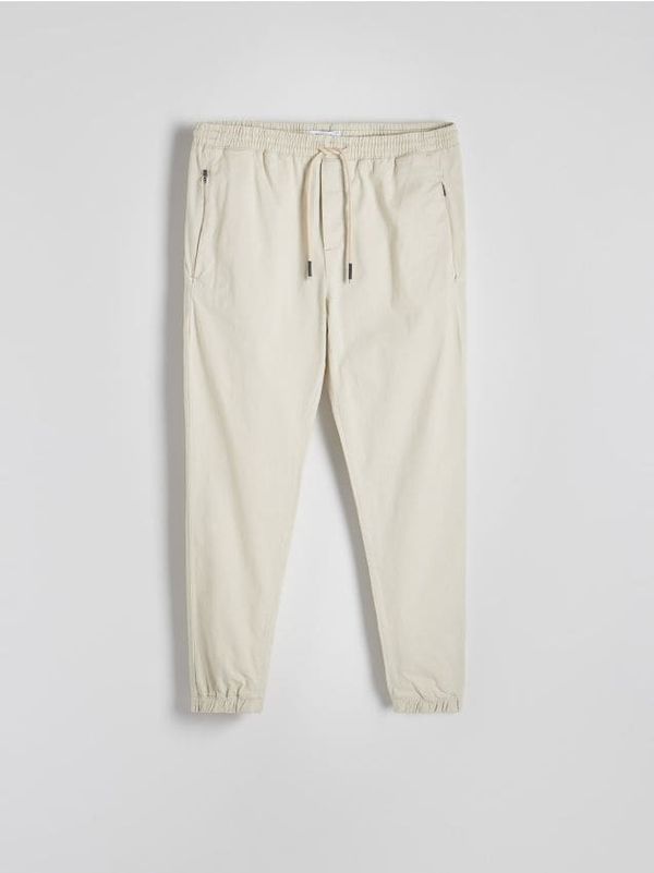Reserved Reserved - Slim jogger hlače - krem